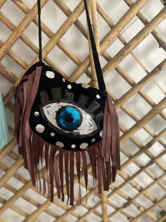 Velvet suede evil eye bag