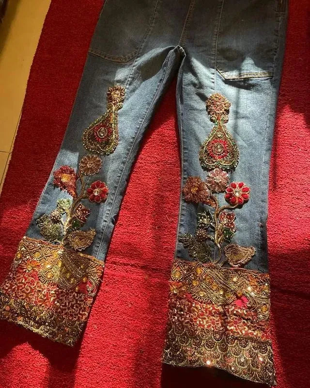 Denim jeans embellished with hand embroidered exquisite fabrics